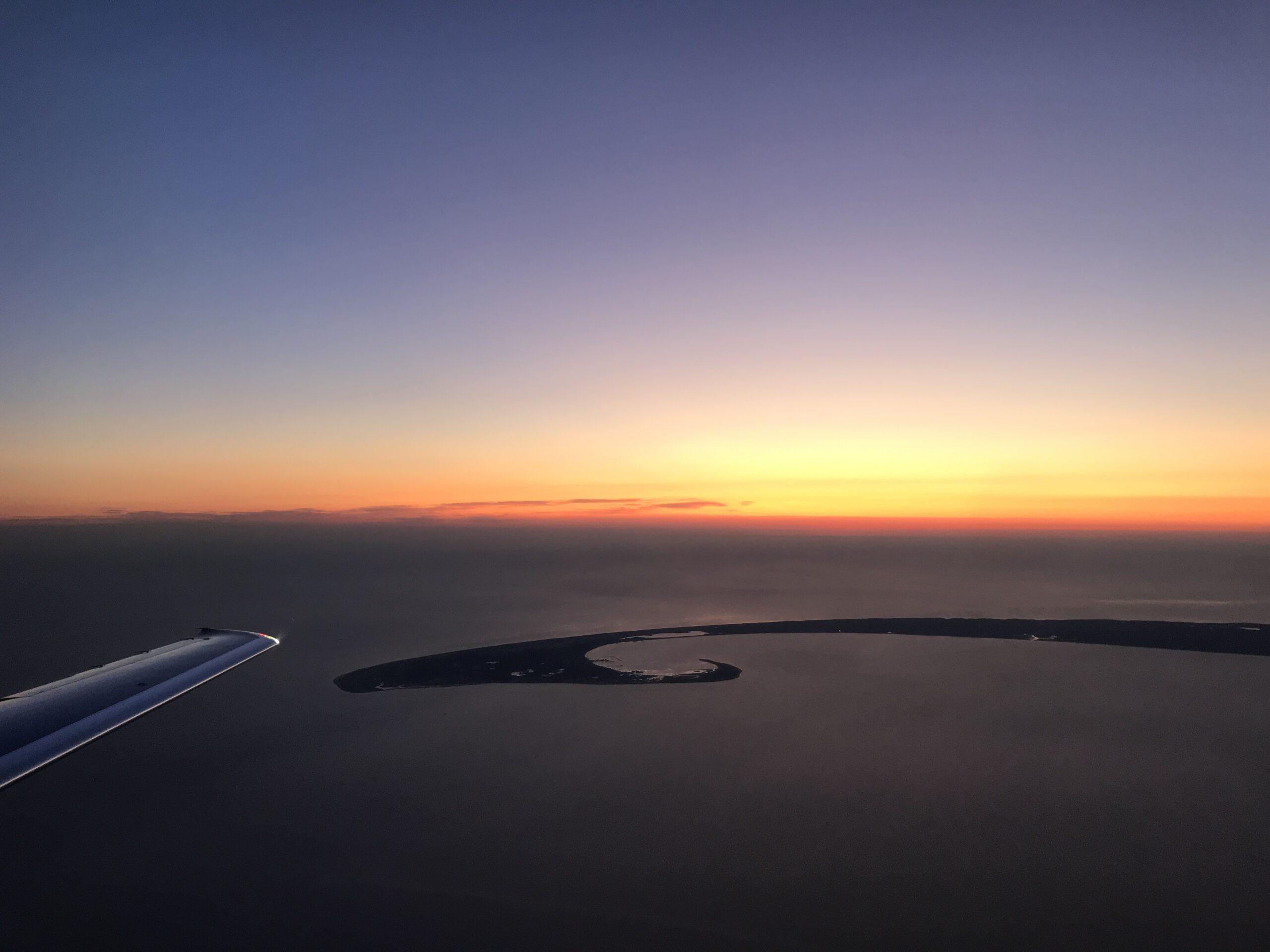 Pilatus aircraft flying over Cape Cod